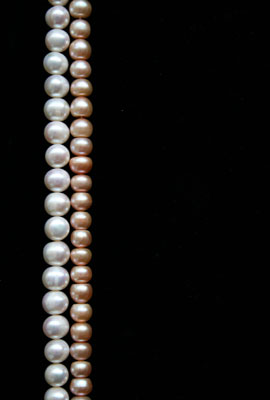 white-pearls-and-pink-pearls-over-black
