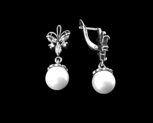 white pearl stud earrings with diamonds