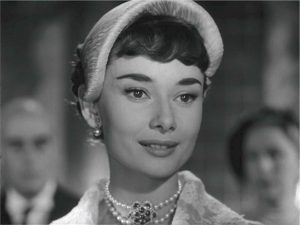 audrey wearing pearls