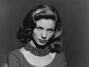 lauren bacall wearing pearls